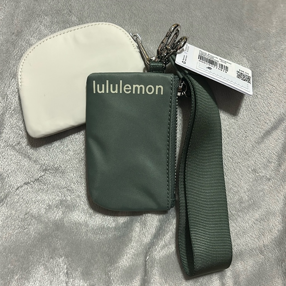 Lululemon dual pouch wristlet in the color GREEN/BONE silver hardware